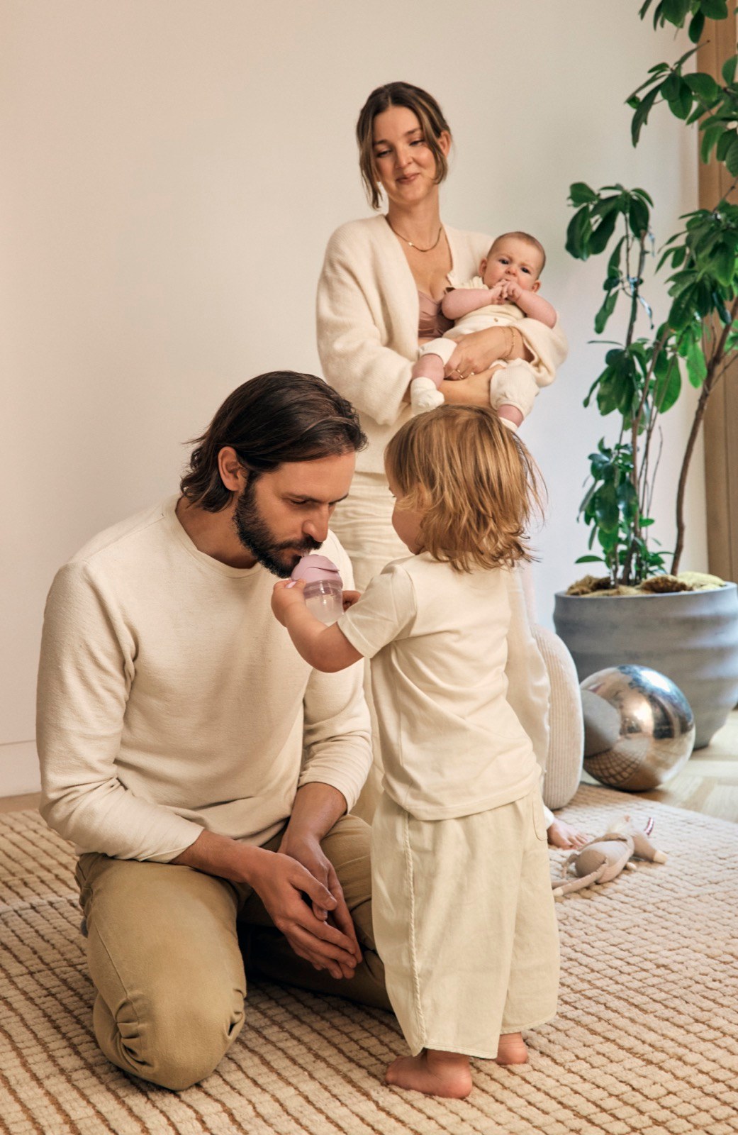 Lansinoh campaign shoot — dad feeding baby